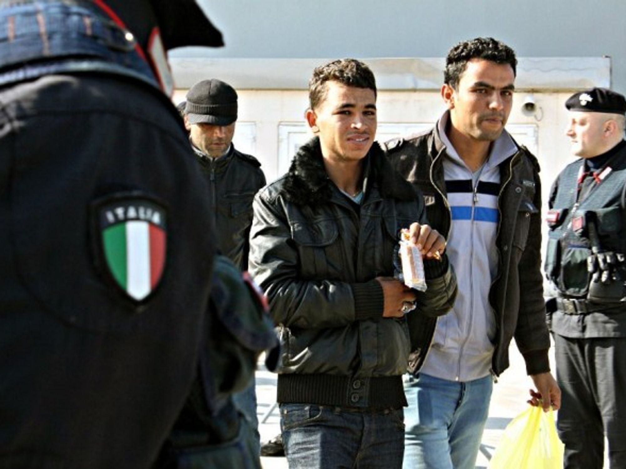 Tunisian migrants arriving in Lampedusa