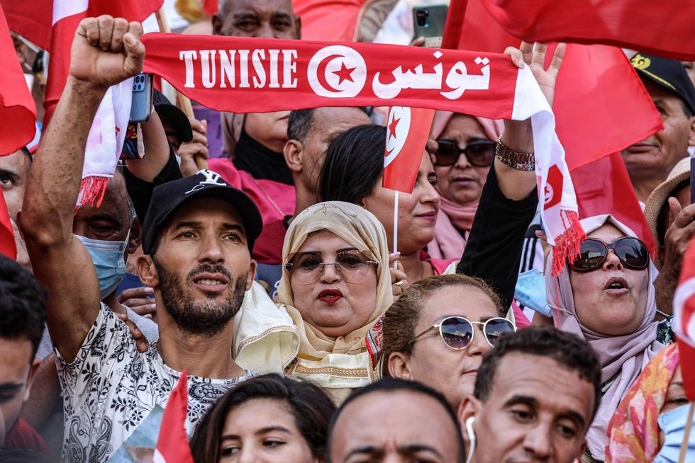 Tunisians taking part in a protest supporting President Kais Saied