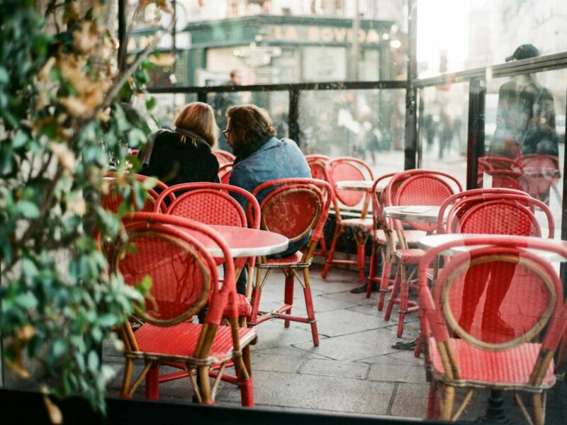 Two people in a café in Paris.