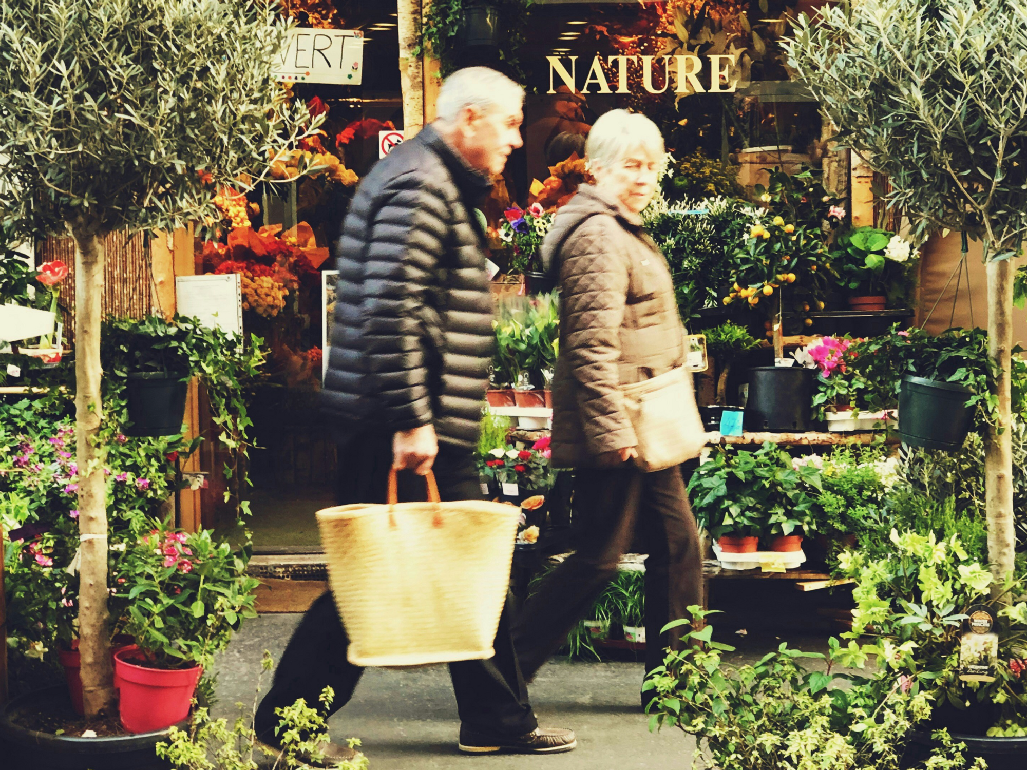 two people walking through town