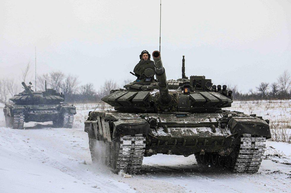 Two Russian tanks in the snow.