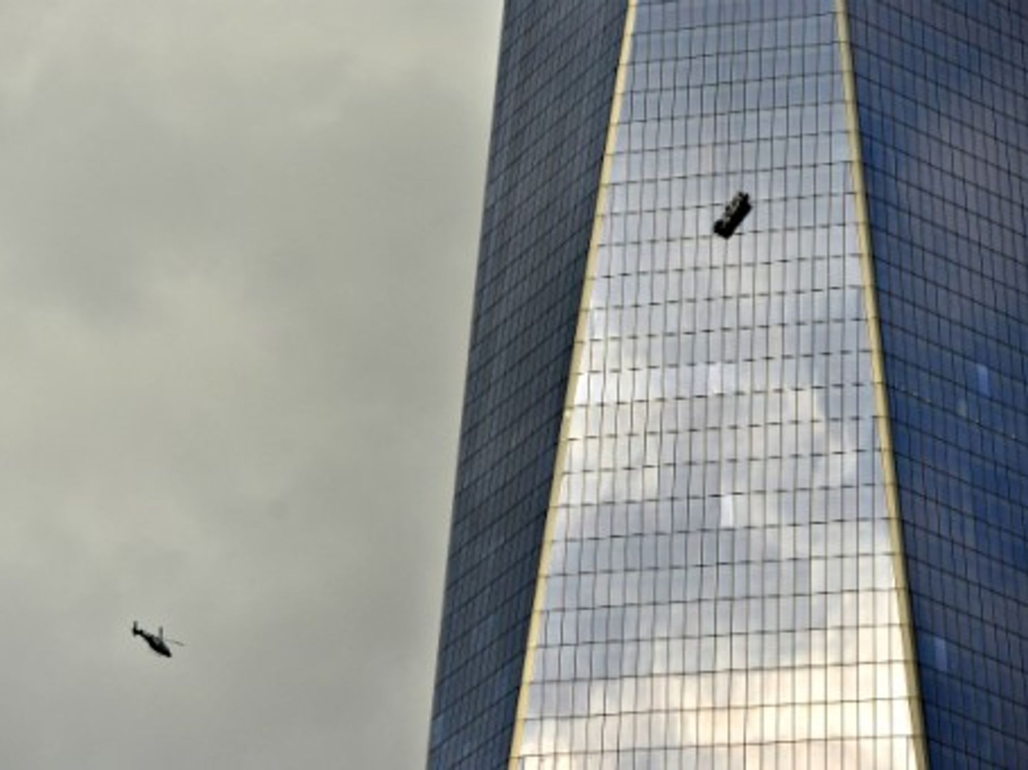 Two window washers were left dangling for almost two hours from the 69th floor of One World Trade Center Wednesday afternoon.