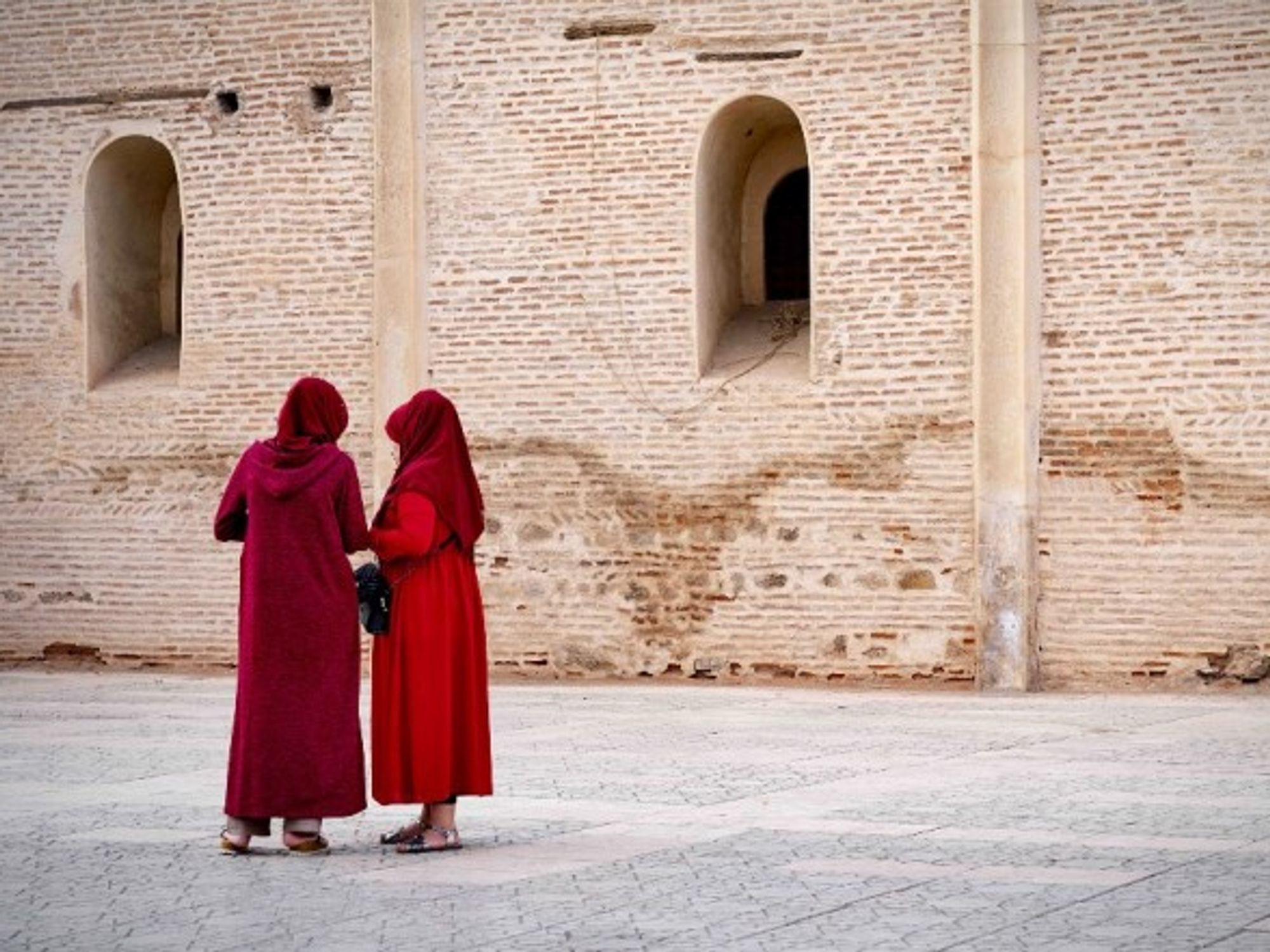 Two women on the streets of Marrakesh, Morocco