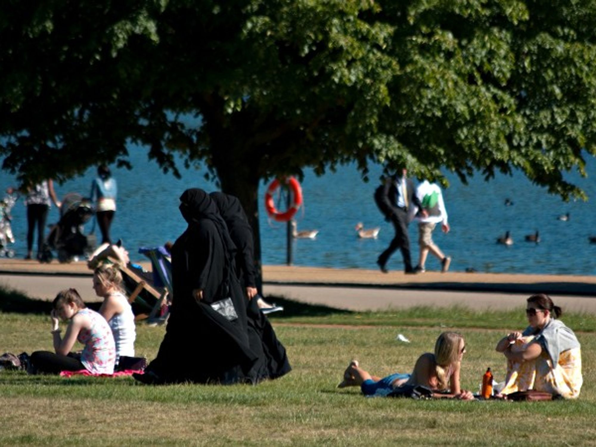 Two women wearing burqas in Hyde Park, London