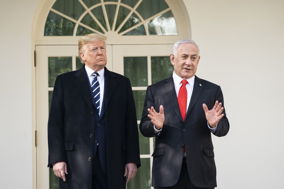 U.S. President Donald Trump meeting with Benjamin Netanyahu at the White House in January 2020.