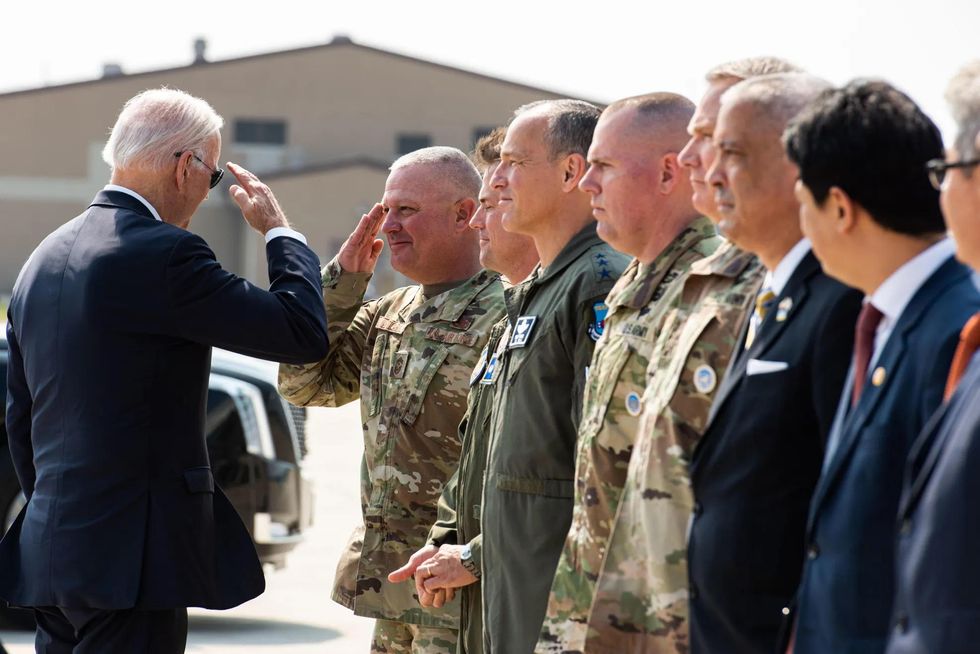 U.S. President Joe Biden salutes South Korean military leadership at Osan airbase during a two day visit to South Korea.