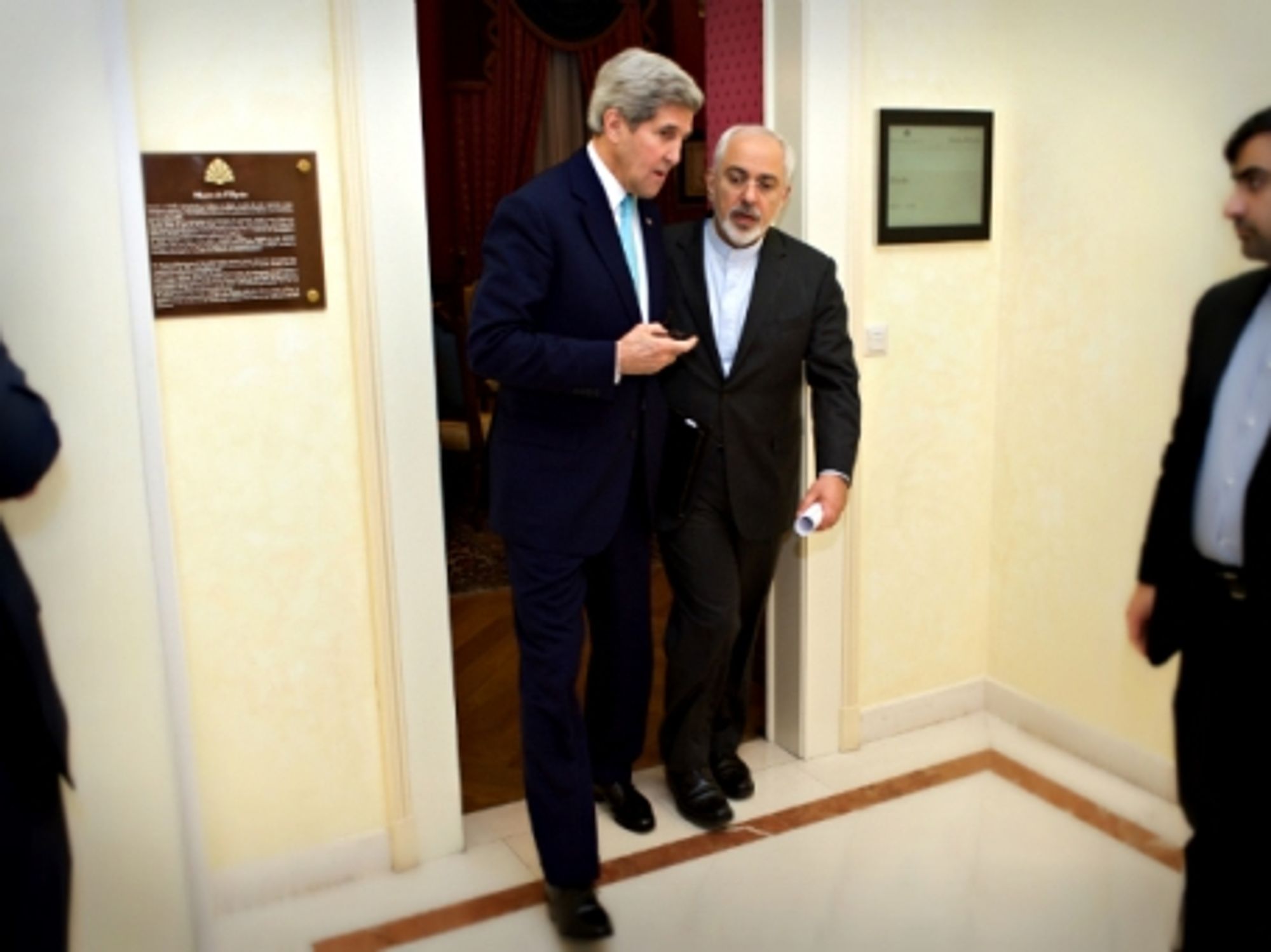 U.S. Secretary of State John Kerry with Iranian Foreign Minister Javad Zarif after a meeting on Iran's nuclear program