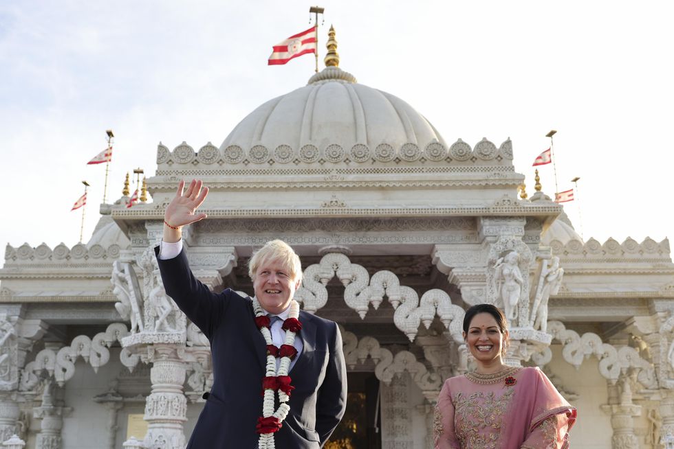 UK Home Secretary Priti Patel during a visit to the Neasden Temple in London with Prime Minister Boris Johnson