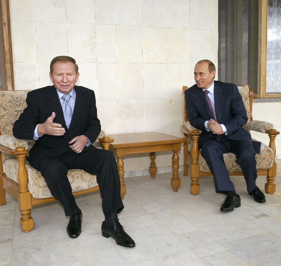 Ukrainian President Leonid Kuchma and Russian President Vladimir Putin in 2015.
