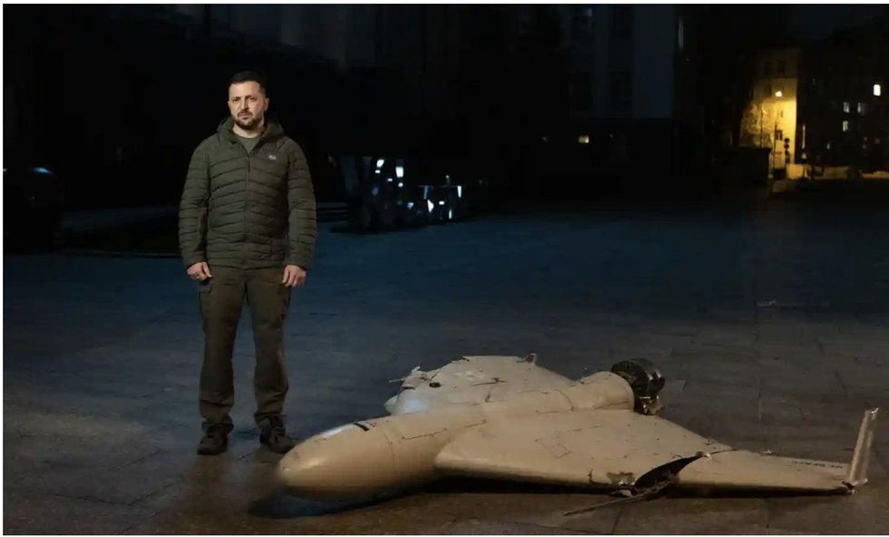 Ukrainian President Volodymyr Zelensky during nightly address standing next to a drone