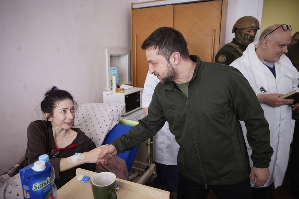 Ukrainian President Volodymyr Zelensky visiting injured Ukrainians in a hospital in Kyiv