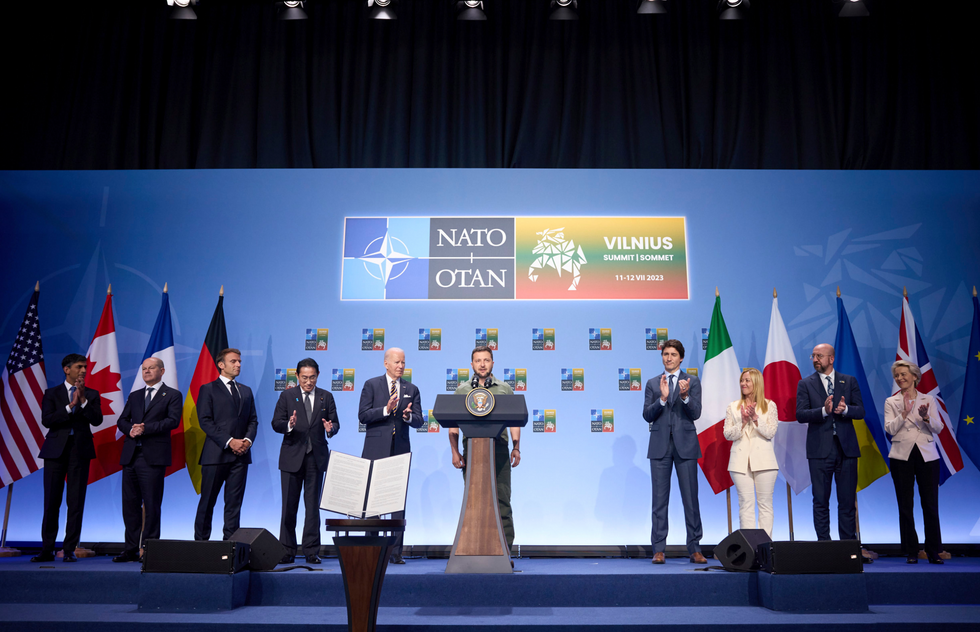 Ukrainian President Volodymyr Zelenskyy, center, delivers remarks during an event with G7 leaders to announce a Joint Declaration of Support for Ukraine during the NATO Summit .