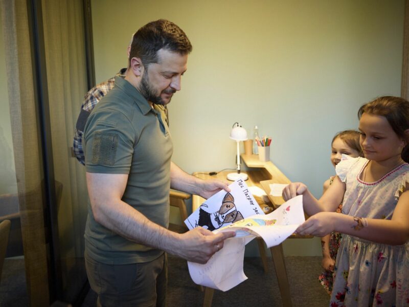 Ukrainian President Volodymyr Zelenskyy presented with drawings by a young girl