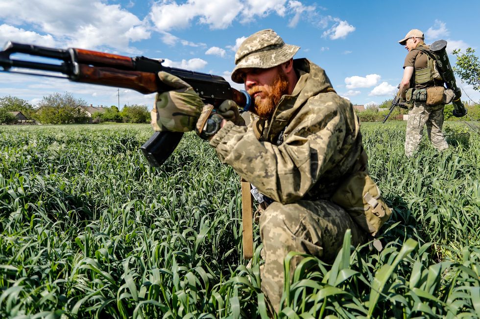 Ukrainian soldier fighting on the ground