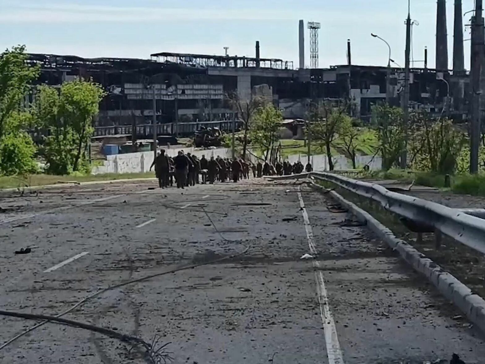 Ukrainian soldiers surrendering at Mariupol's Azovstal steelworks​