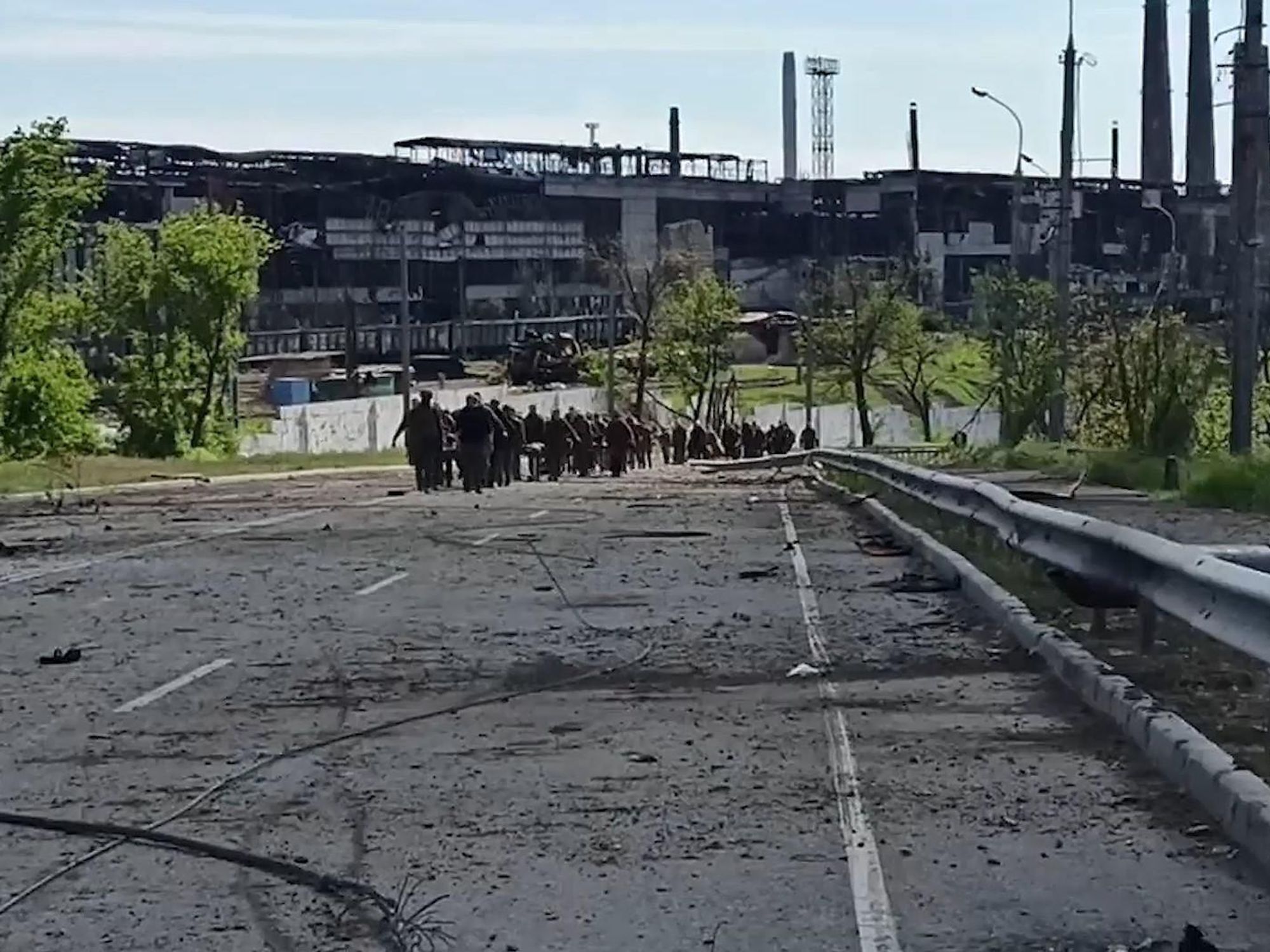 Ukrainian soldiers surrendering at Mariupol's Azovstal steelworks​