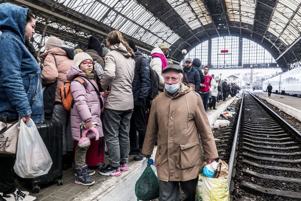 Ukrainians waiting for a train at Lviv station to leave the country, a couple of days after the start of the Russian invasion in February 2022.