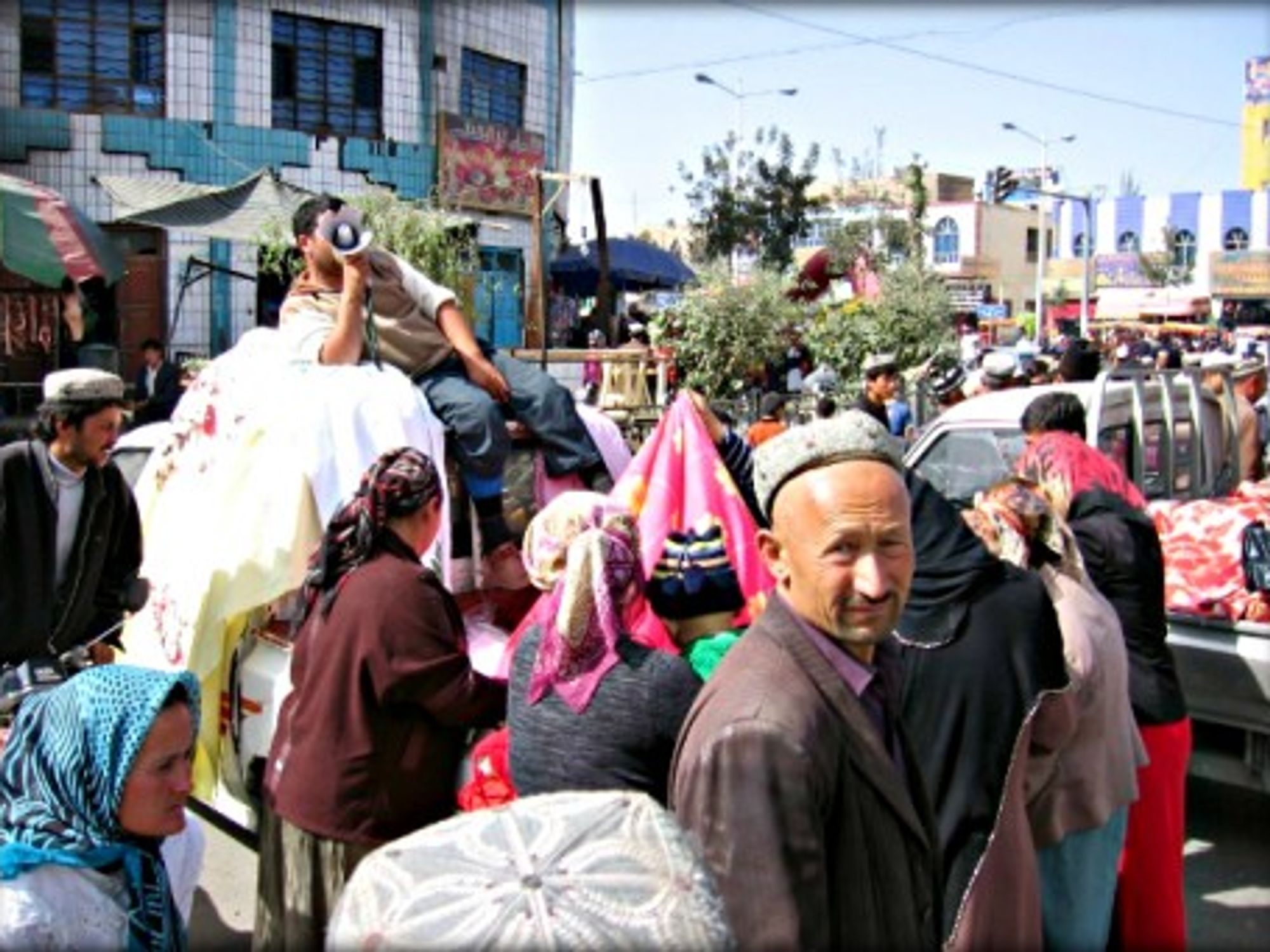 Uyghurs at a market