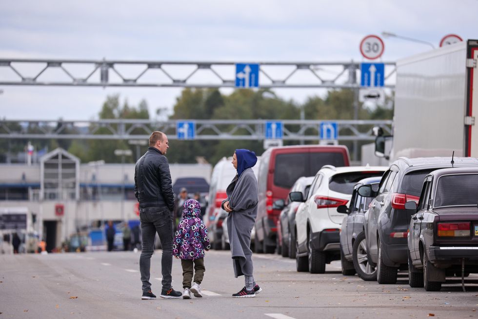 Vehicles queue by the Burachki checkpoint on the Russian-Latvian border