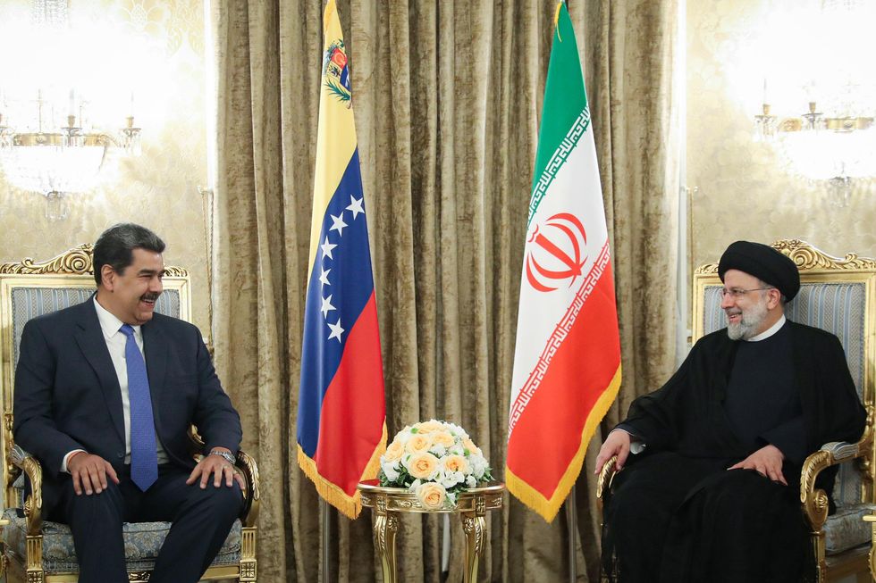 Venezuela President Nicolas Maduro with his Iranian counterpart Ebrahim Raisi during a visit in Tehran
