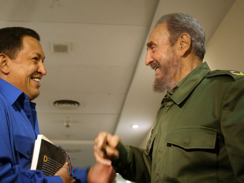 Venezuelan President Hugo Chavez , left, talks with his Cuban counterpart Fidel Castro during a summit in 2006.
