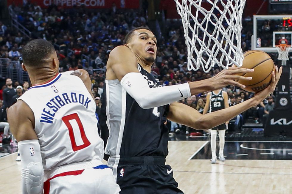 Victor Wembanyama goes against Russell Westbrook from the Los Angeles Clippers.