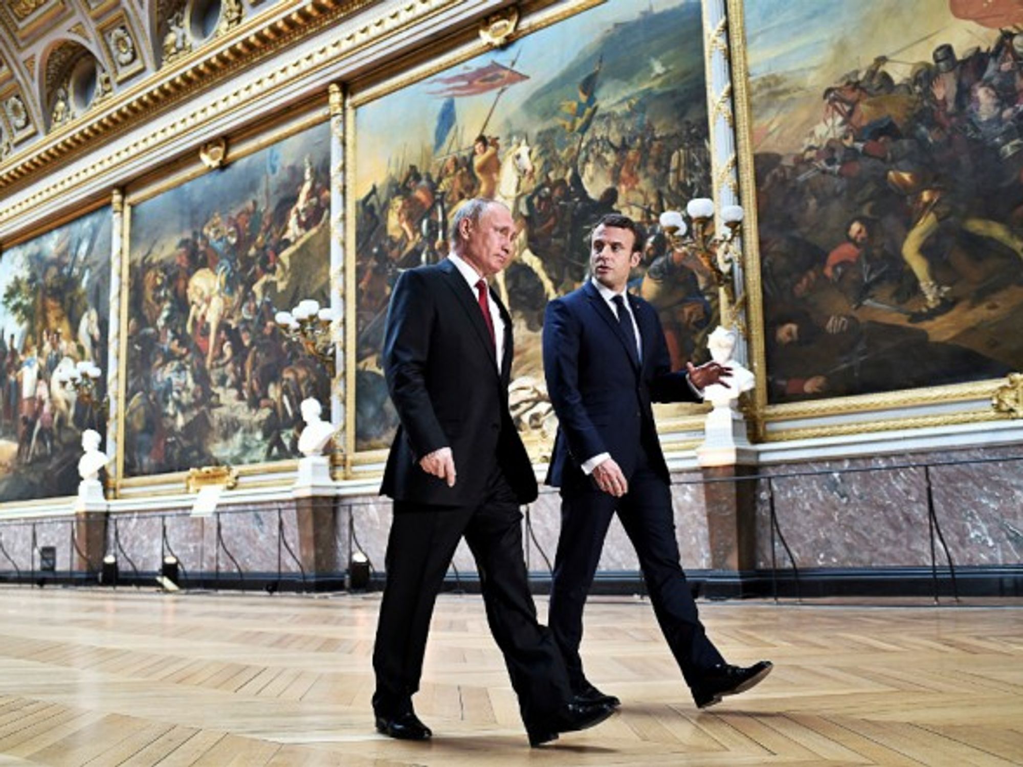 Vladimir Putin and Emmanuel Macron during their meeting in Versailles, on May 29