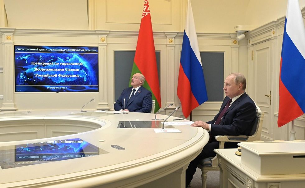 Vladimir Putin and President of Belarus Alexander Lukashenko observe strategic deterrence forces exercise in the Kremlin’s situation room