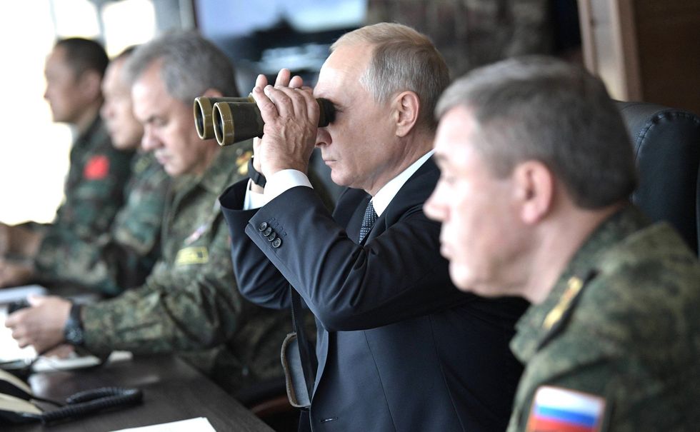 Vladimir Putin observing the main stage of Vostok military manoeuvres (2018)