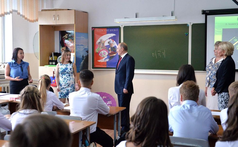 Vladimir Putin visiting a high school