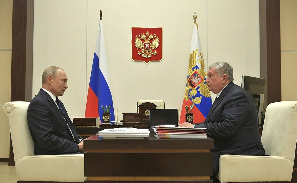 Vladimir Putin with Igor Sechin, Chairman of the Management Board of Rosneft.
