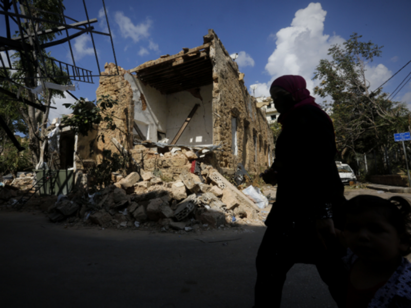 Walking past the ruble in Beirut on Aug. 9