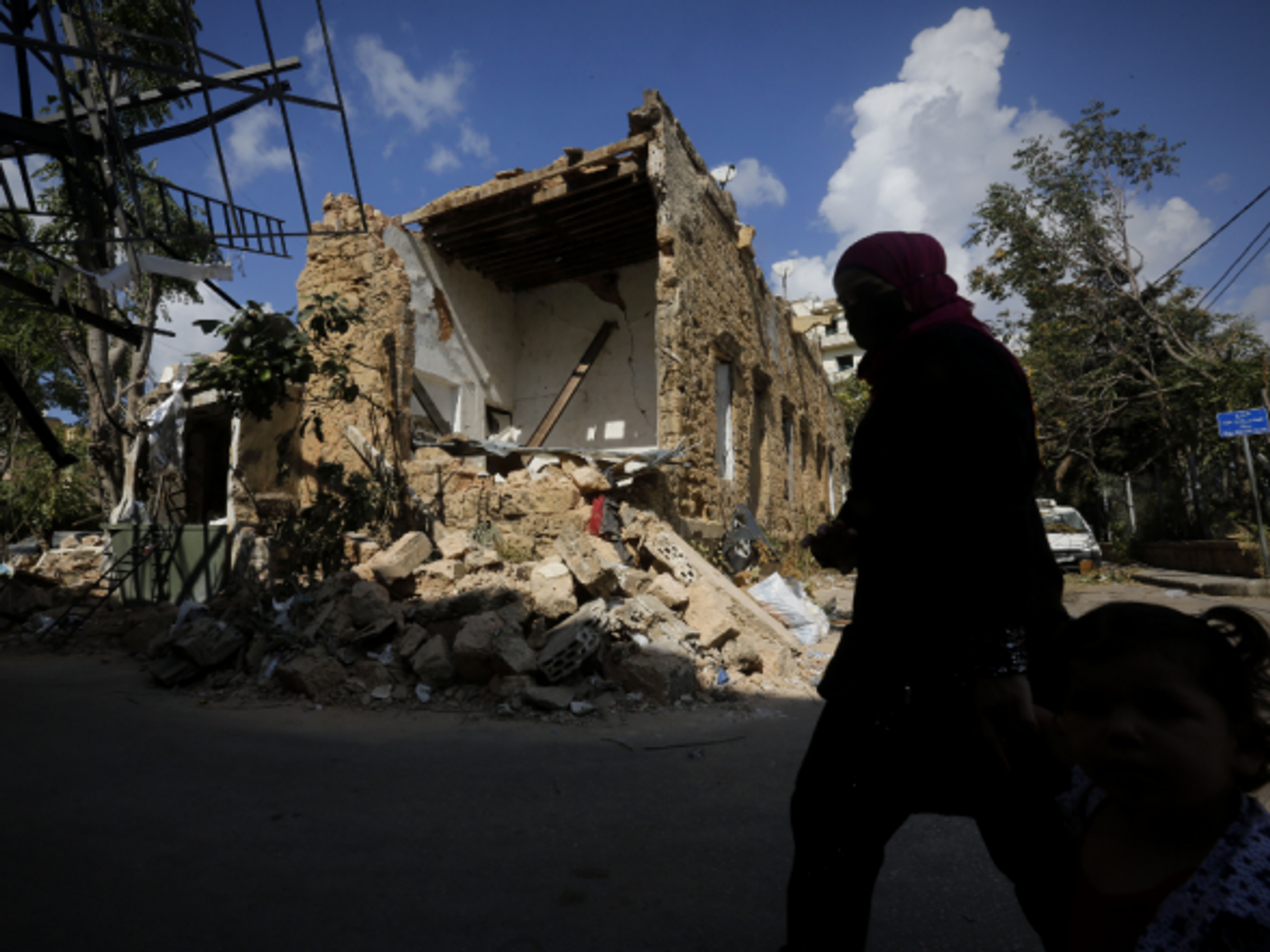 Walking past the ruble in Beirut on Aug. 9
