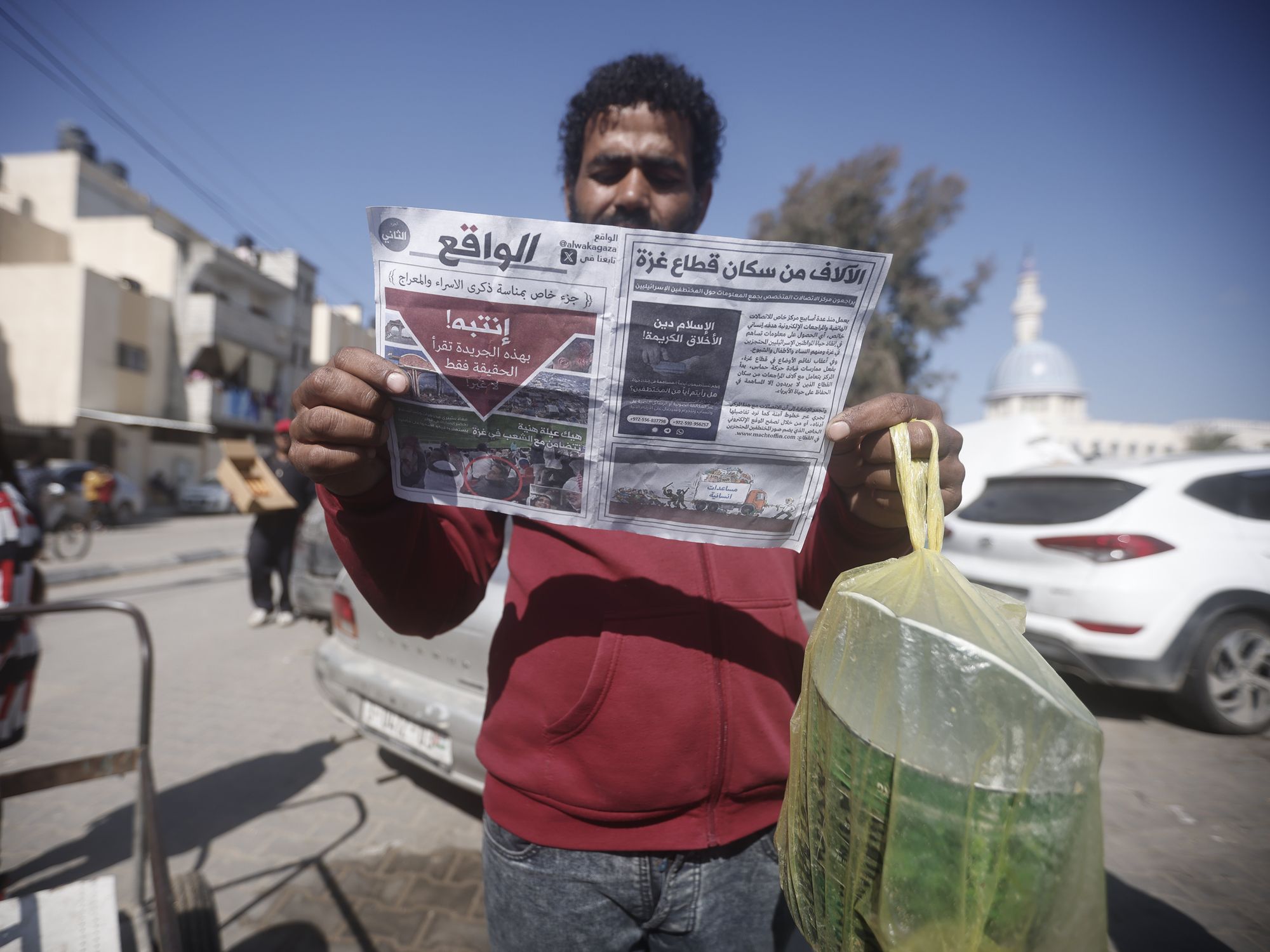 Warning leaflets are dropped by Israeli forces over Rafah in the southern Gaza Strip.