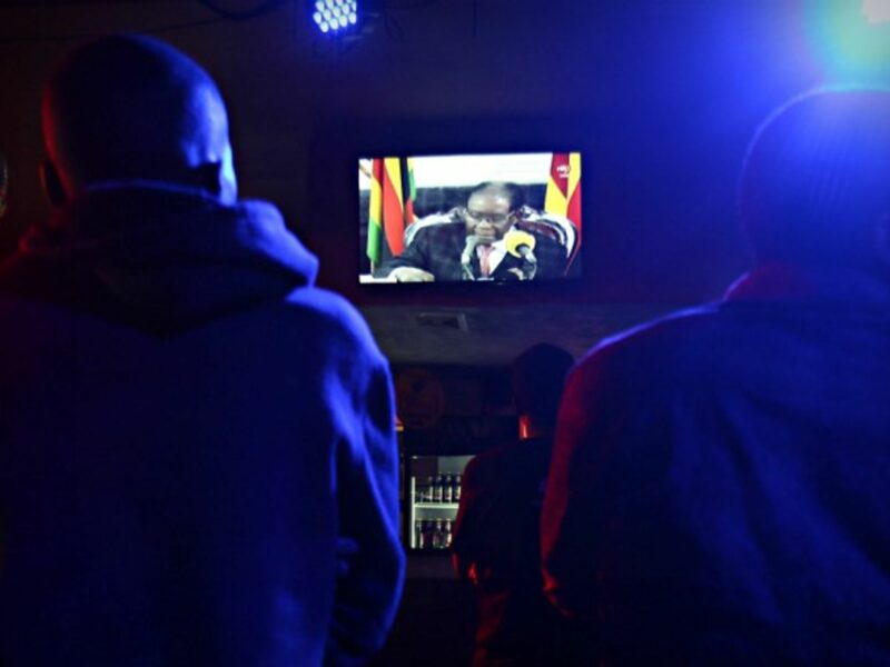 Watching Mugabe's address on TV in Harare on Nov. 19