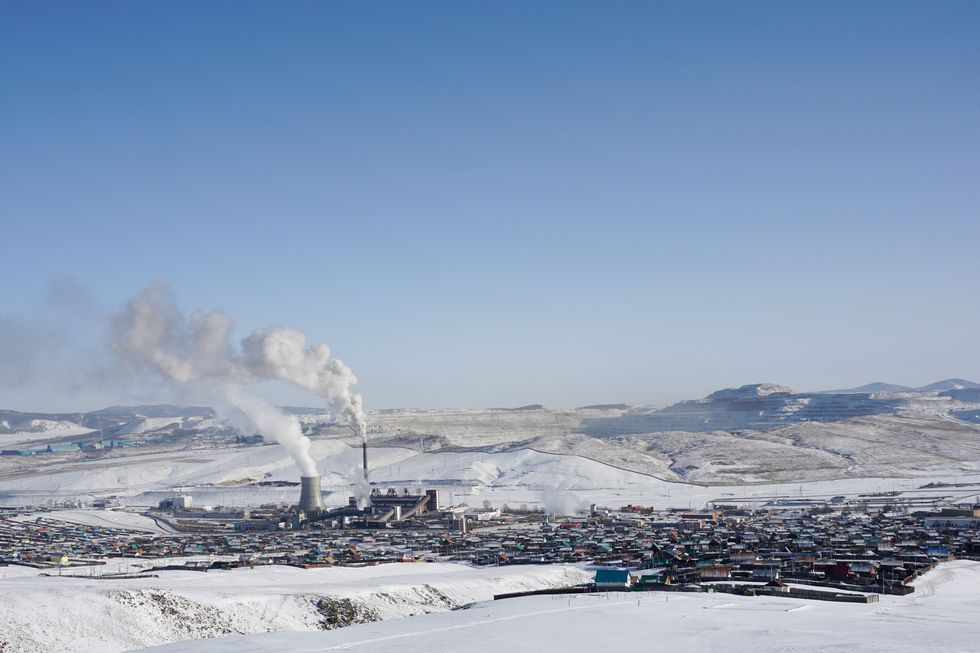 White dust blows from the Erdenet copper mine's dumping area in the snow-covered landscape around the residential areas of Govil and Bayantsagaan in Mongolia's Orkhon province. The dust, known around the world as tailings dust, contains lead, zinc and arsenic — all toxins that local people say are making them sick.
