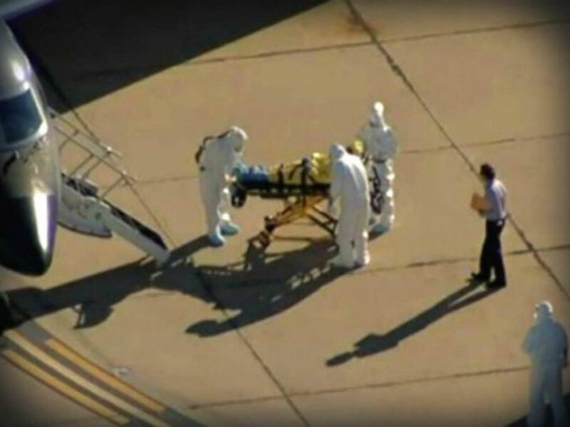 Who is this reckless clipboard man at Dallas airport Ebola scene?