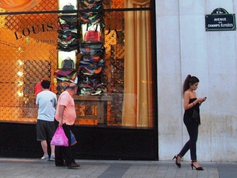 Window shopping along the Champs-Élysées in Paris