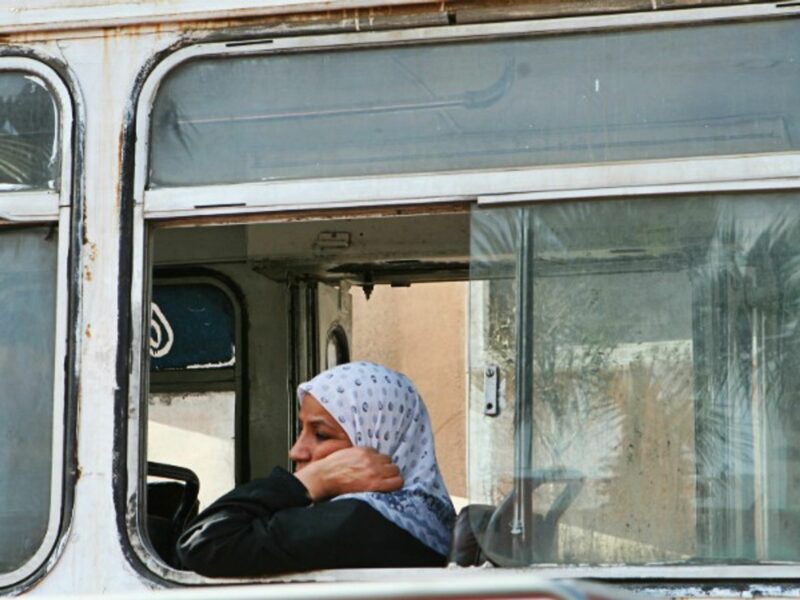 Woman on a bus in Cairo