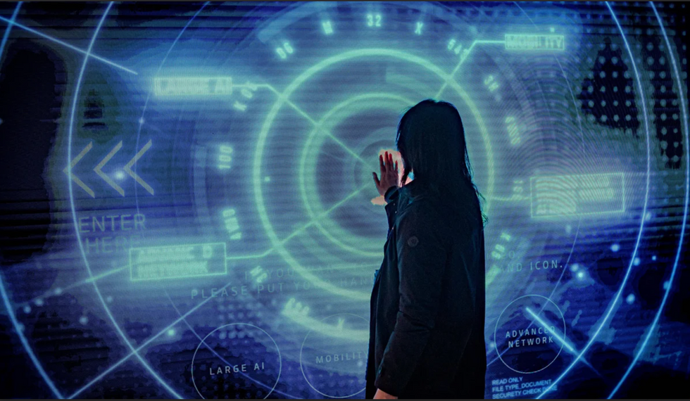 Woman touching a touchscreen