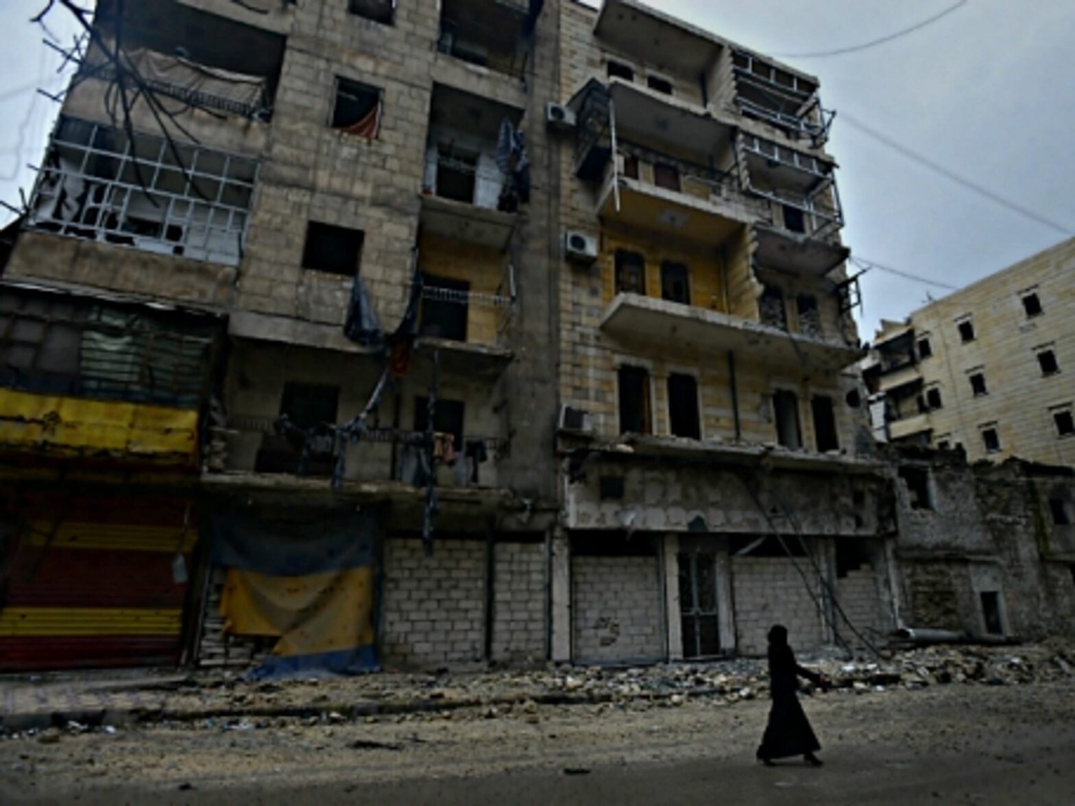 Woman walking in Aleppo, Syria