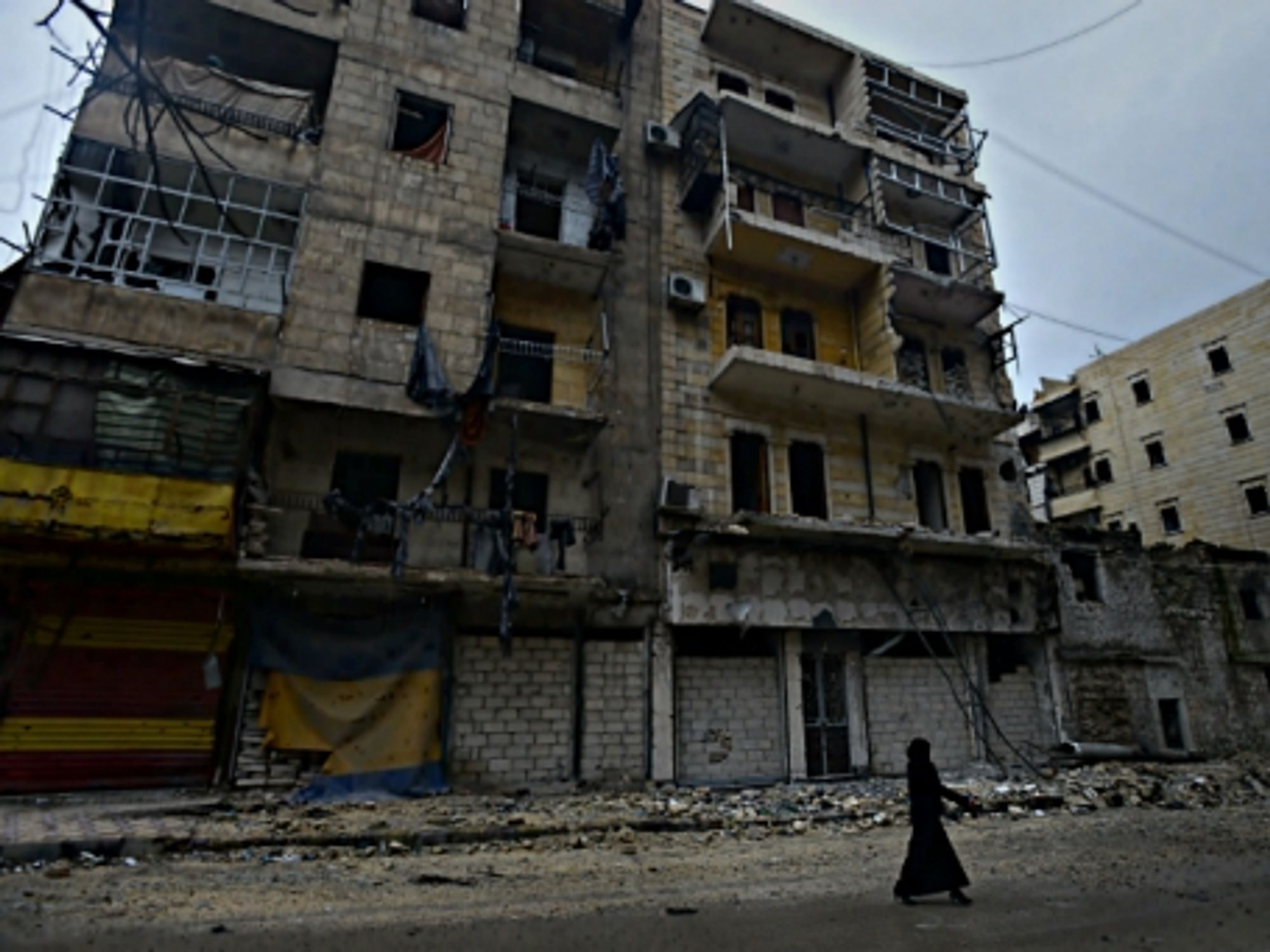 Woman walking in Aleppo, Syria
