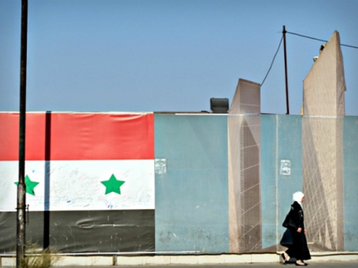 Woman walking in Damascus, Syria