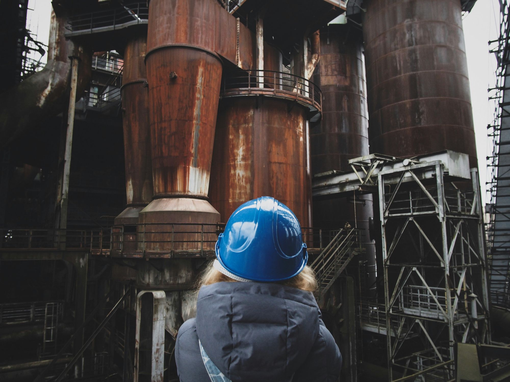 woman wearing blue safety helmet