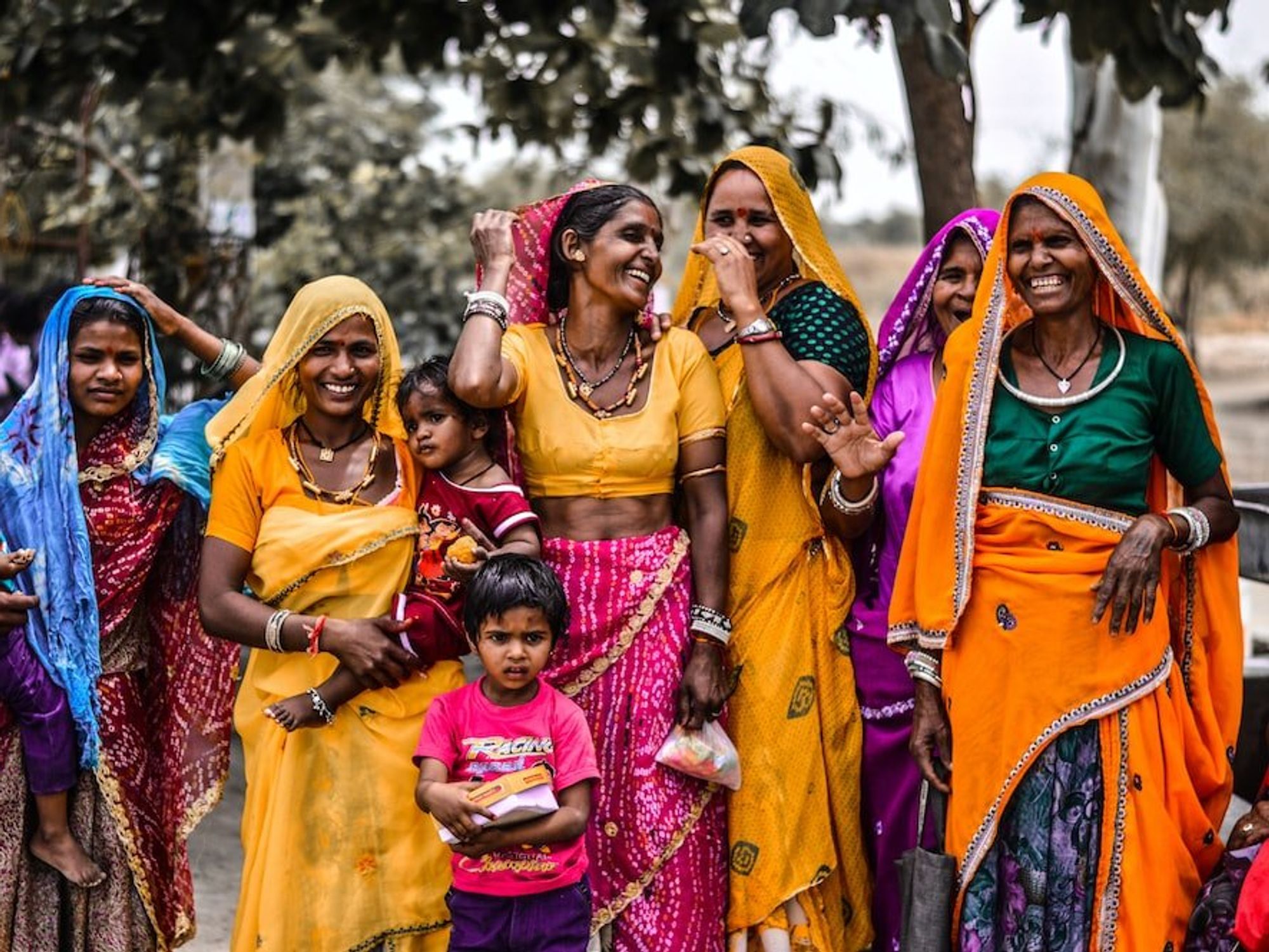 Women and children posing for a photo in Jodhpur, Rajasthan, India.