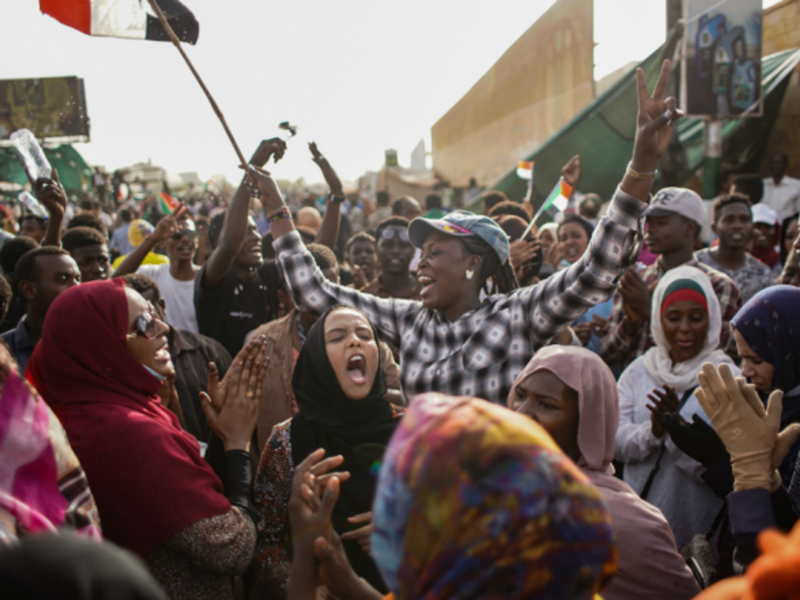 Women celebrating in Khartoum on April 11