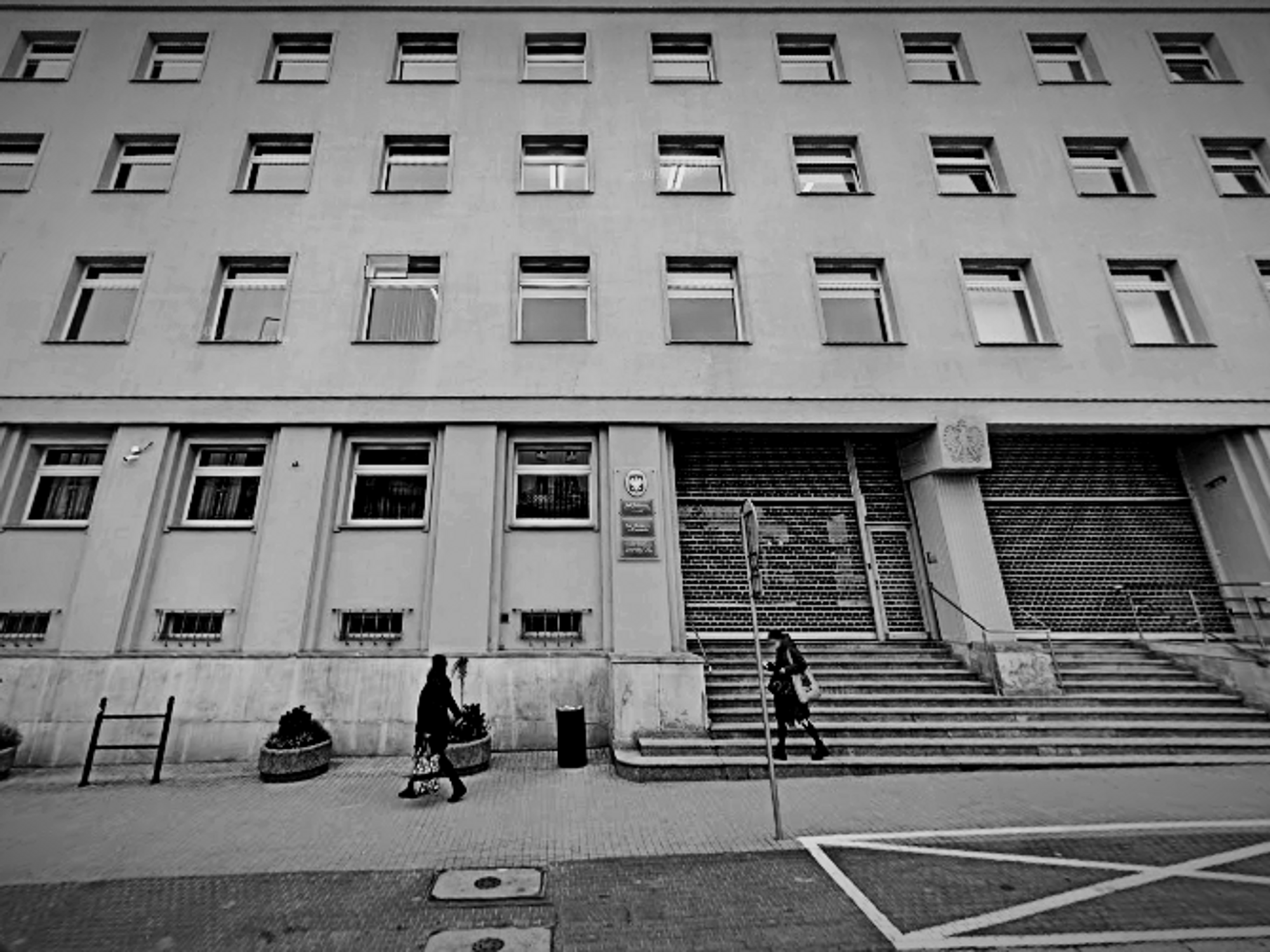 Women walking through the streets of Poznań, Poland.