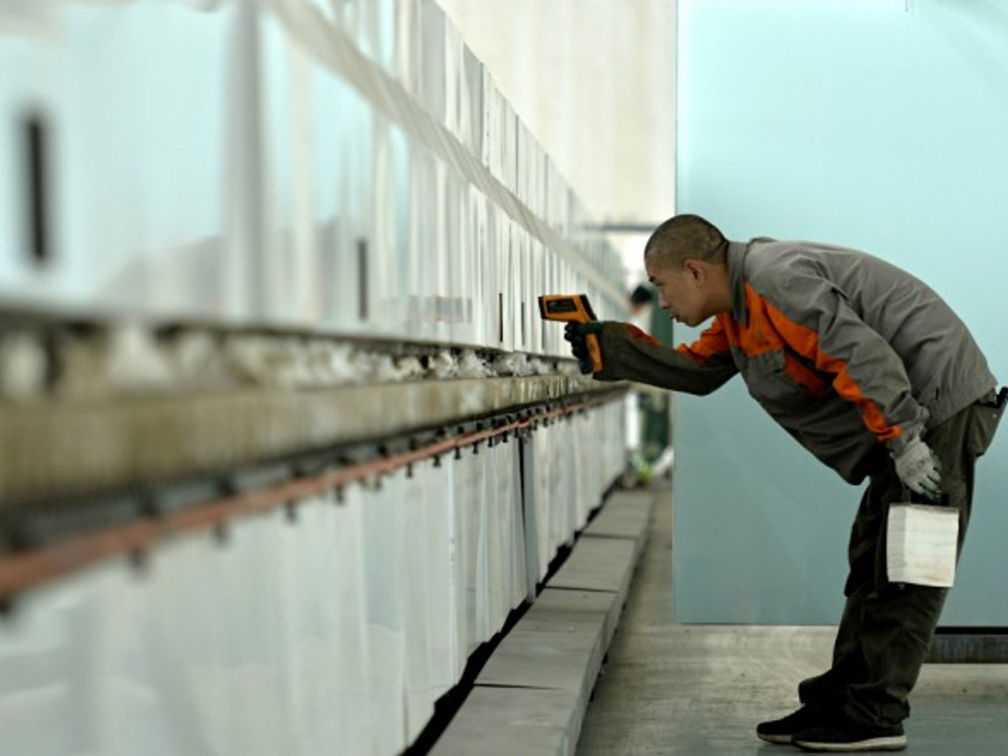 Worker at one of various glass enterprises that strengthened Chinese science, technology innovation and market research