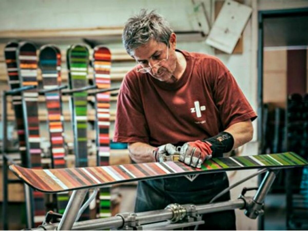 Worker manufacturing skis at the Zai factory in Disentis