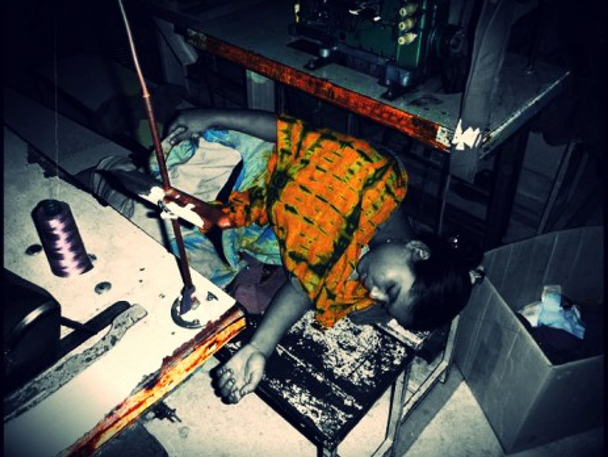 Worker sleeping in a garment factory in Dhaka